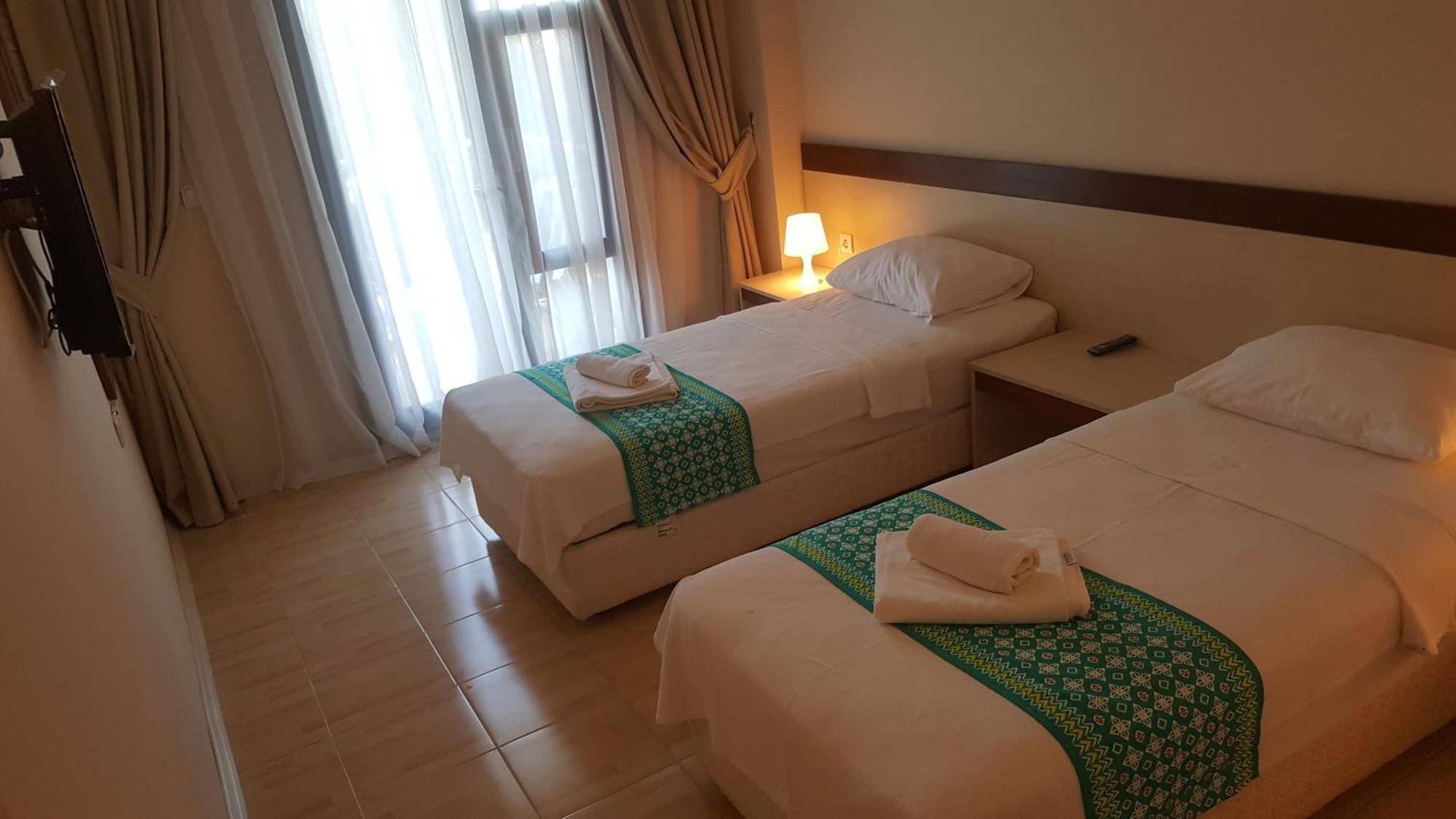 Atlas Apart Hotel Cesme Bagian luar foto